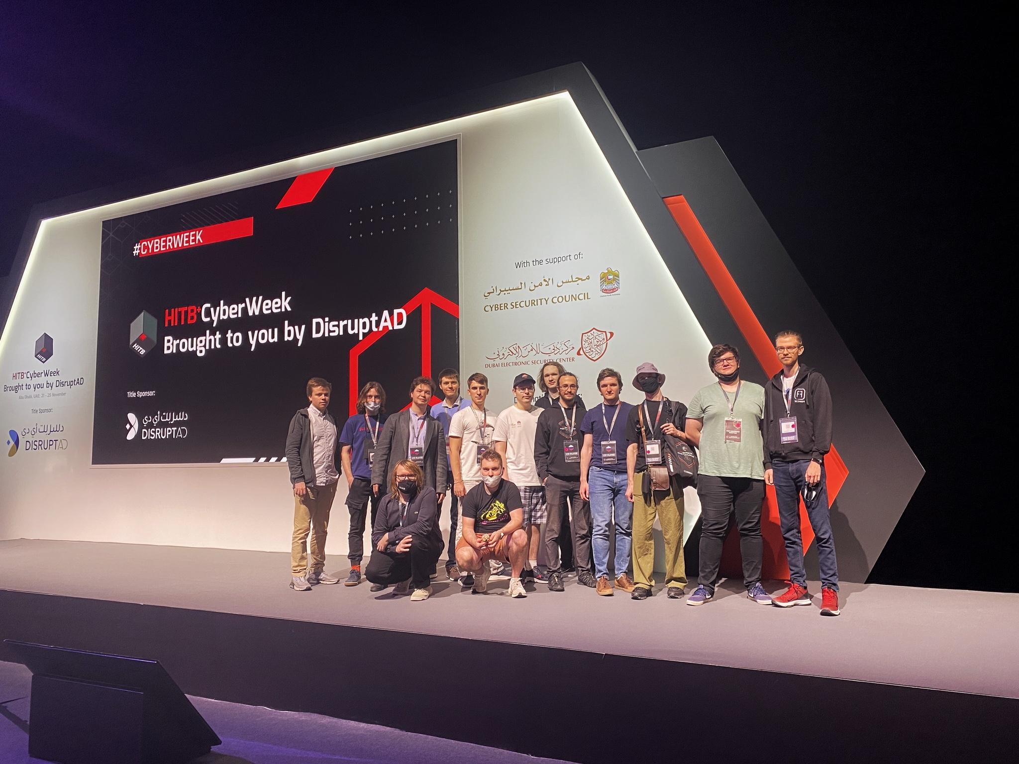 C4T BuT S4D team on the stage of HITB 2022 in Abu Dhabi